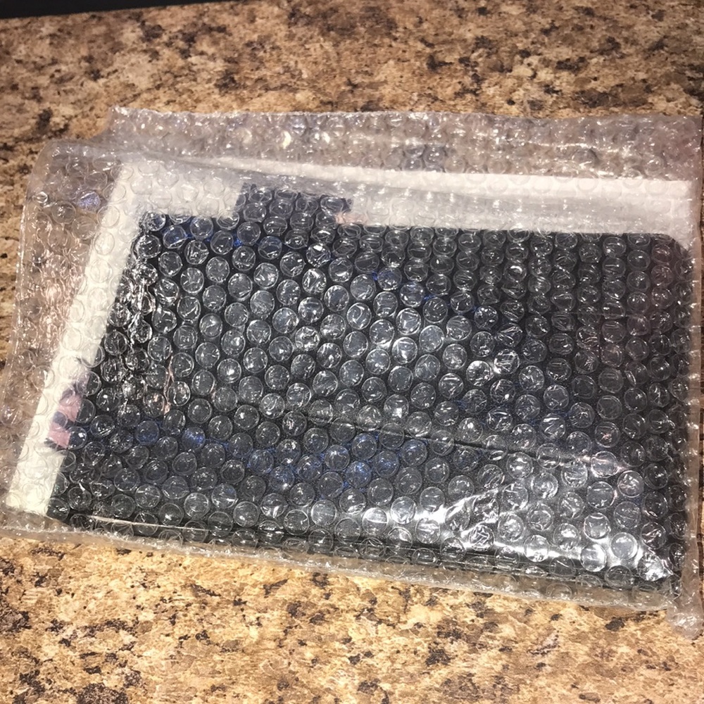 Vintage Mary Kay mirror with stand in bubble wrap sleeve